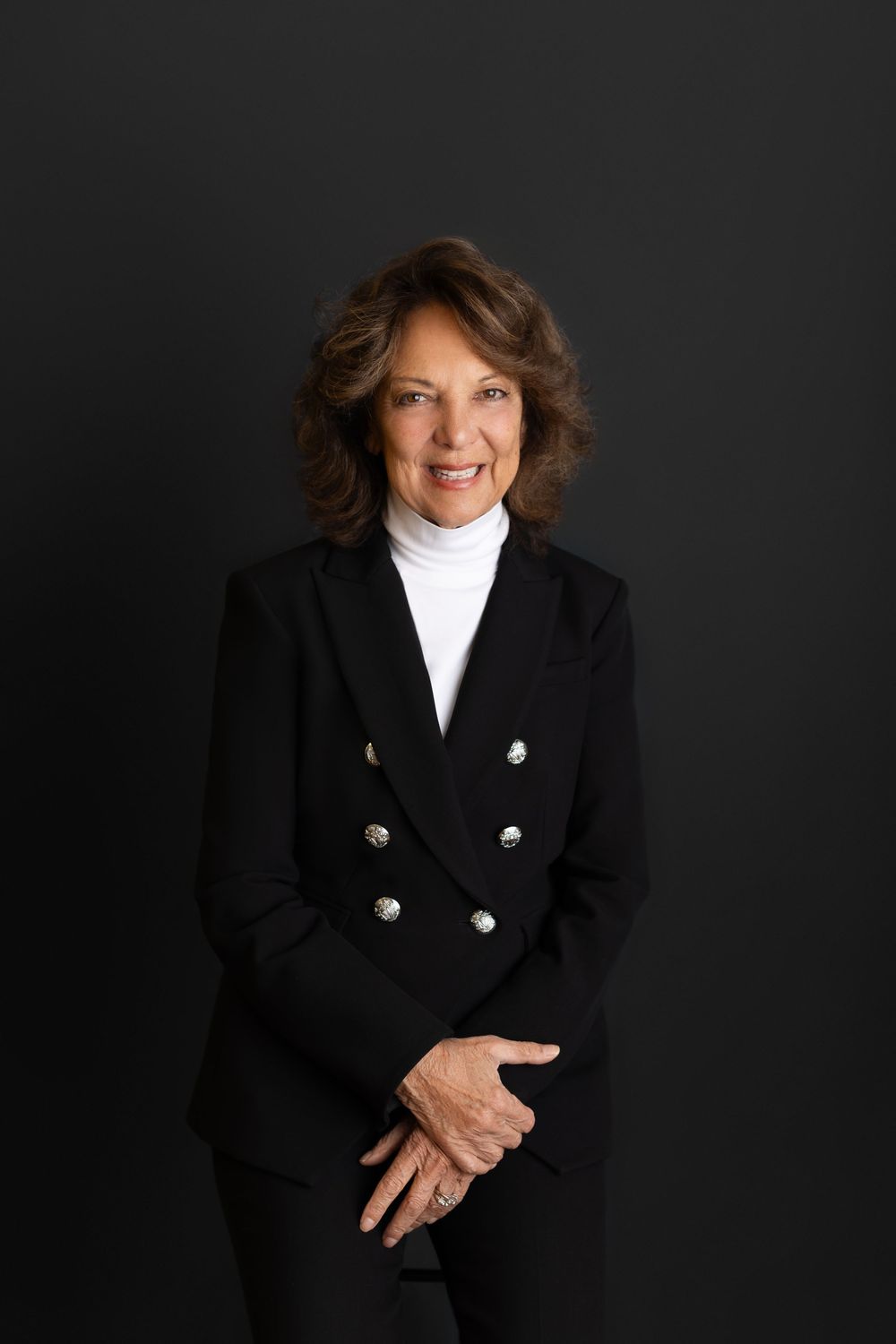 studio portrait series showing someone in a black blazer and white top. Headshot & Branding NJ Photographer