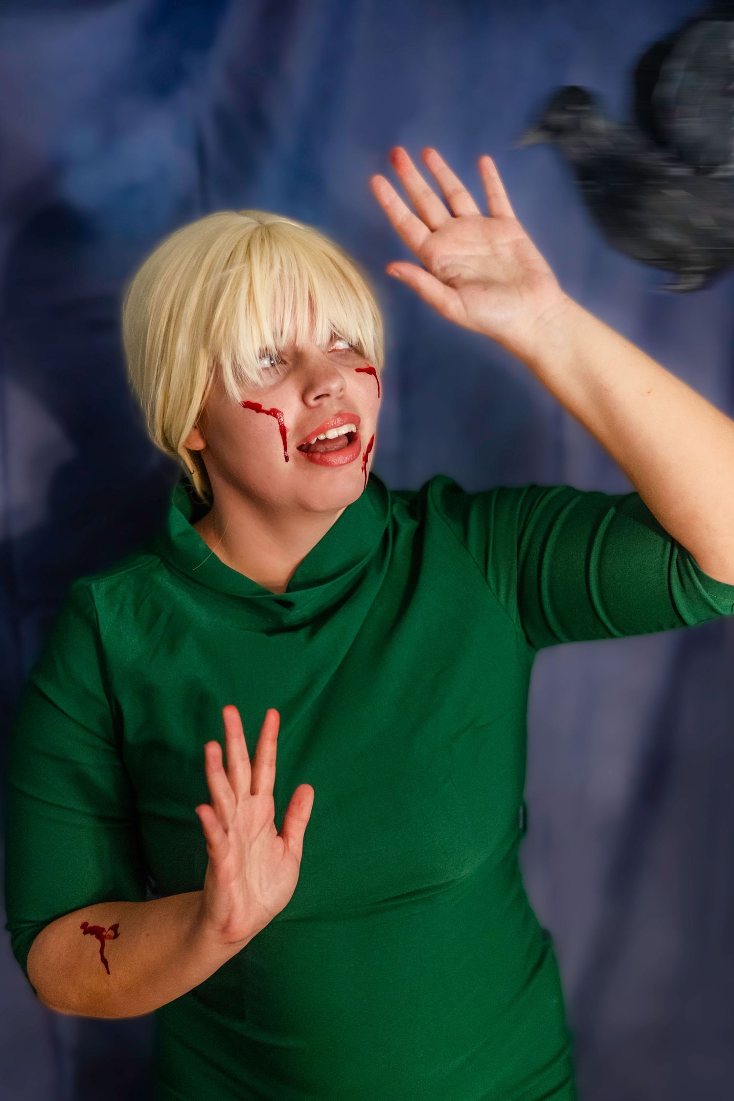 Person in emerald green pencil bodycon dress emotional distress the birds alfred hitchcock halloween costume