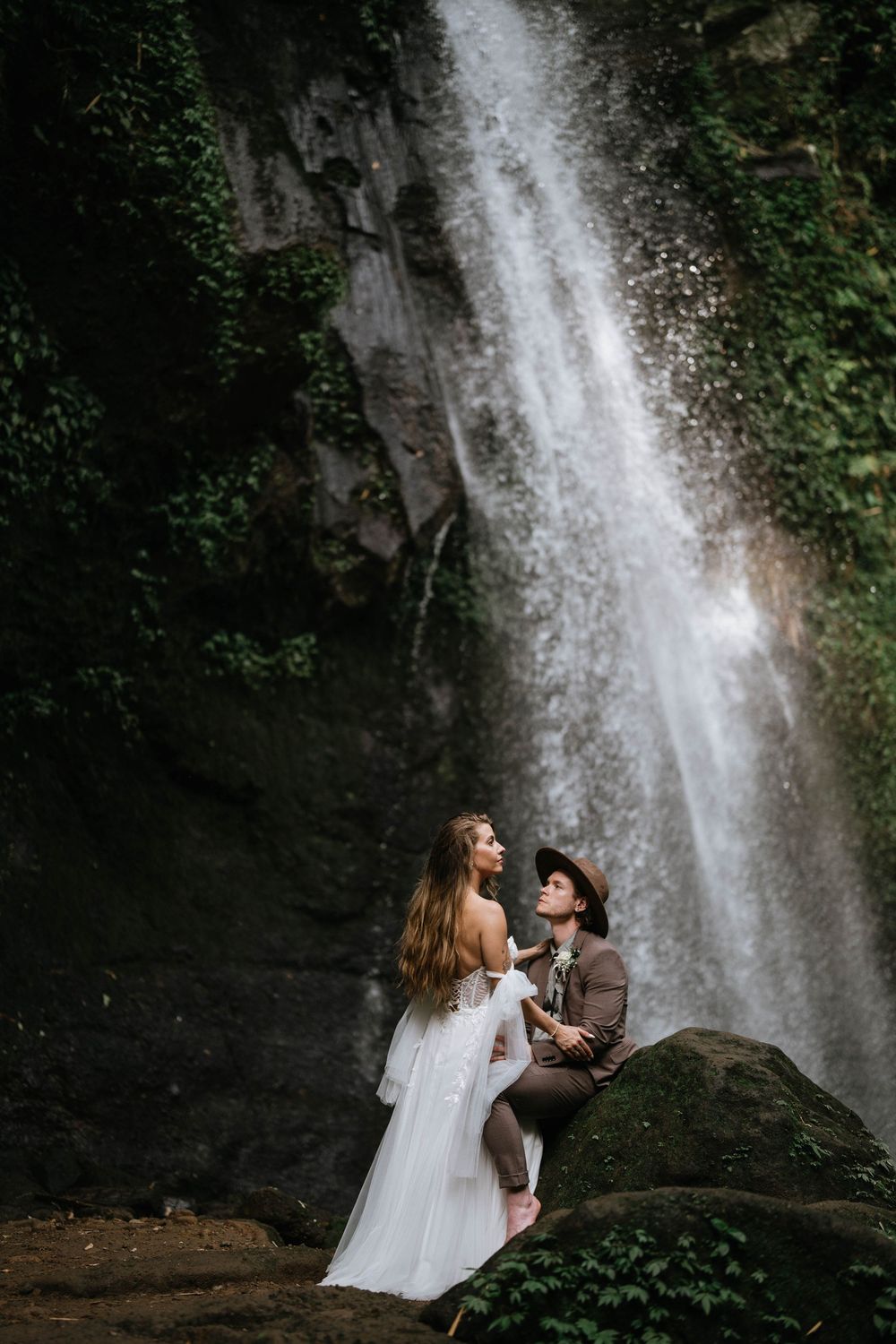 Natural light prewedding photography session at Ulu Petanu Waterfall Bali.