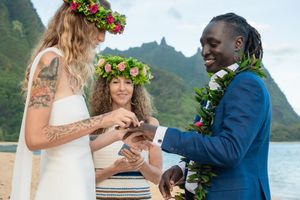 kauai beach wedding photographer, studio3511 photography- couple on beach with mountains in the background