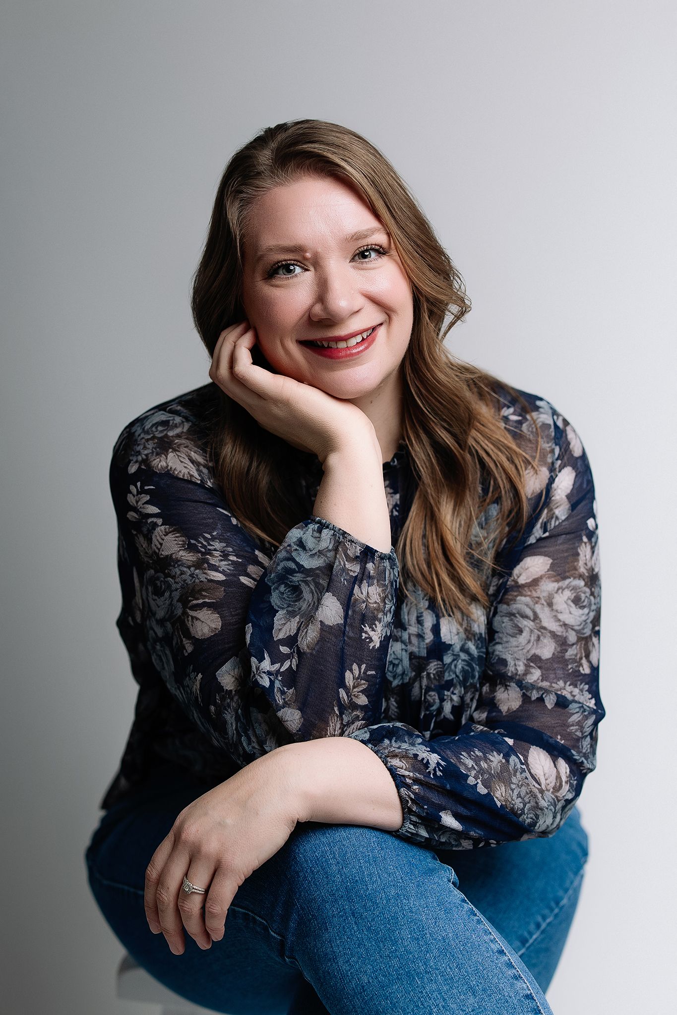 headshot of professional newborn photographer in lee's summit missouri