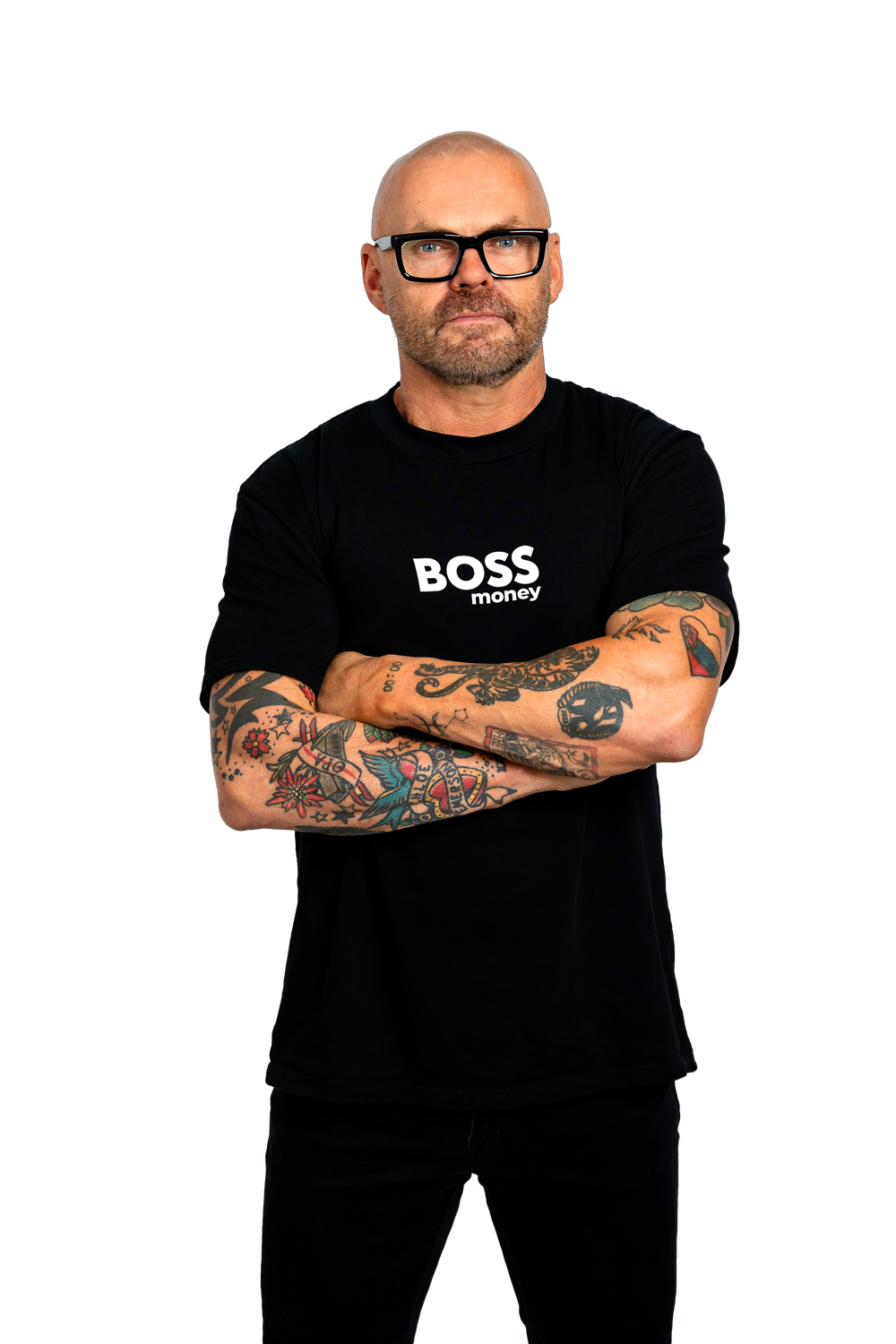Person in black t-shirt with 'BOSS' text wearing glasses and showing tattooed arms in crossed position against white background.