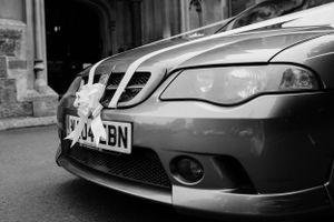Vintage Mercedes-Benz car details shown in black and white photography.