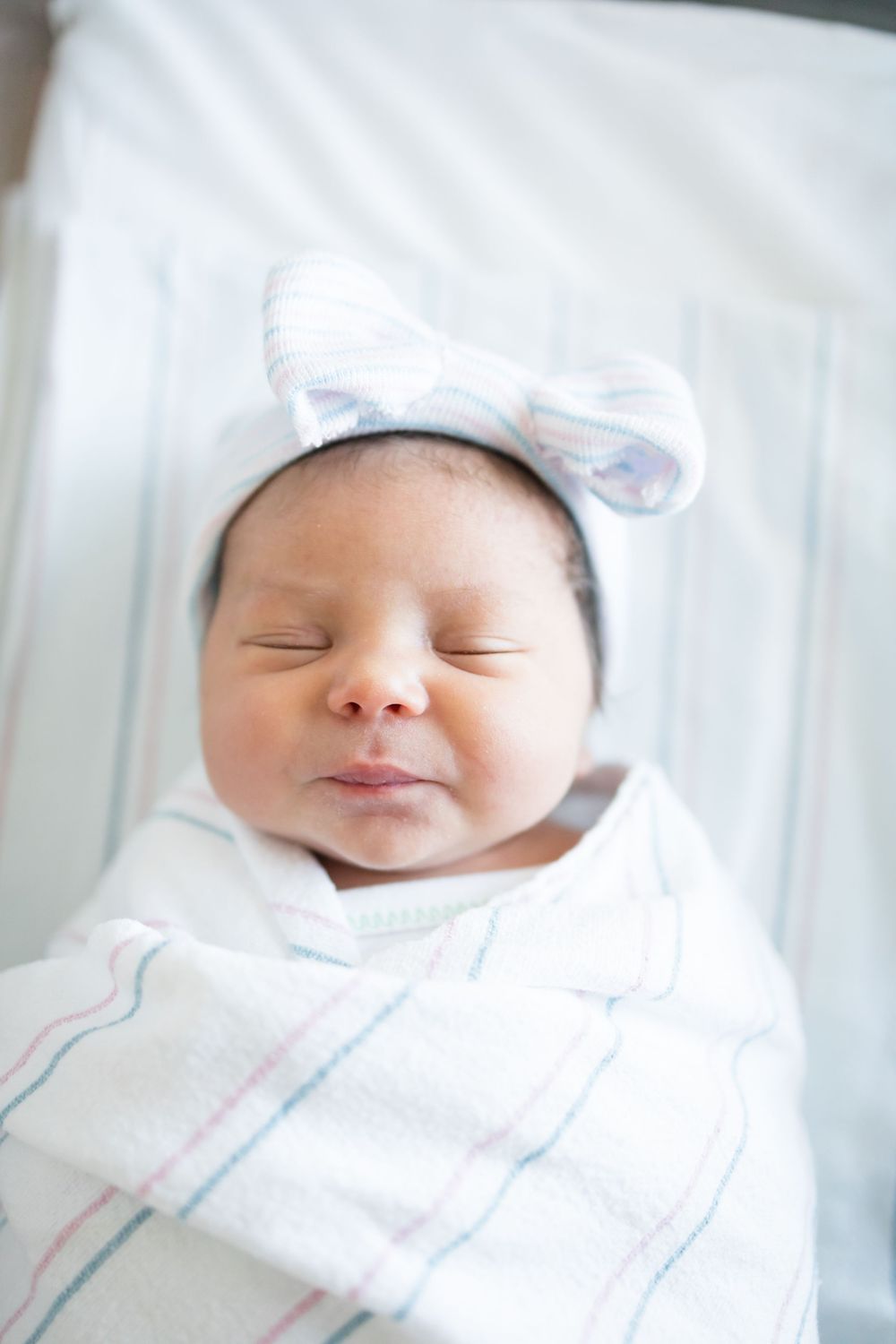 Sleeping newborn baby girl during her Fresh 48 session at Fort Sanders Medical Center in Knoxville.