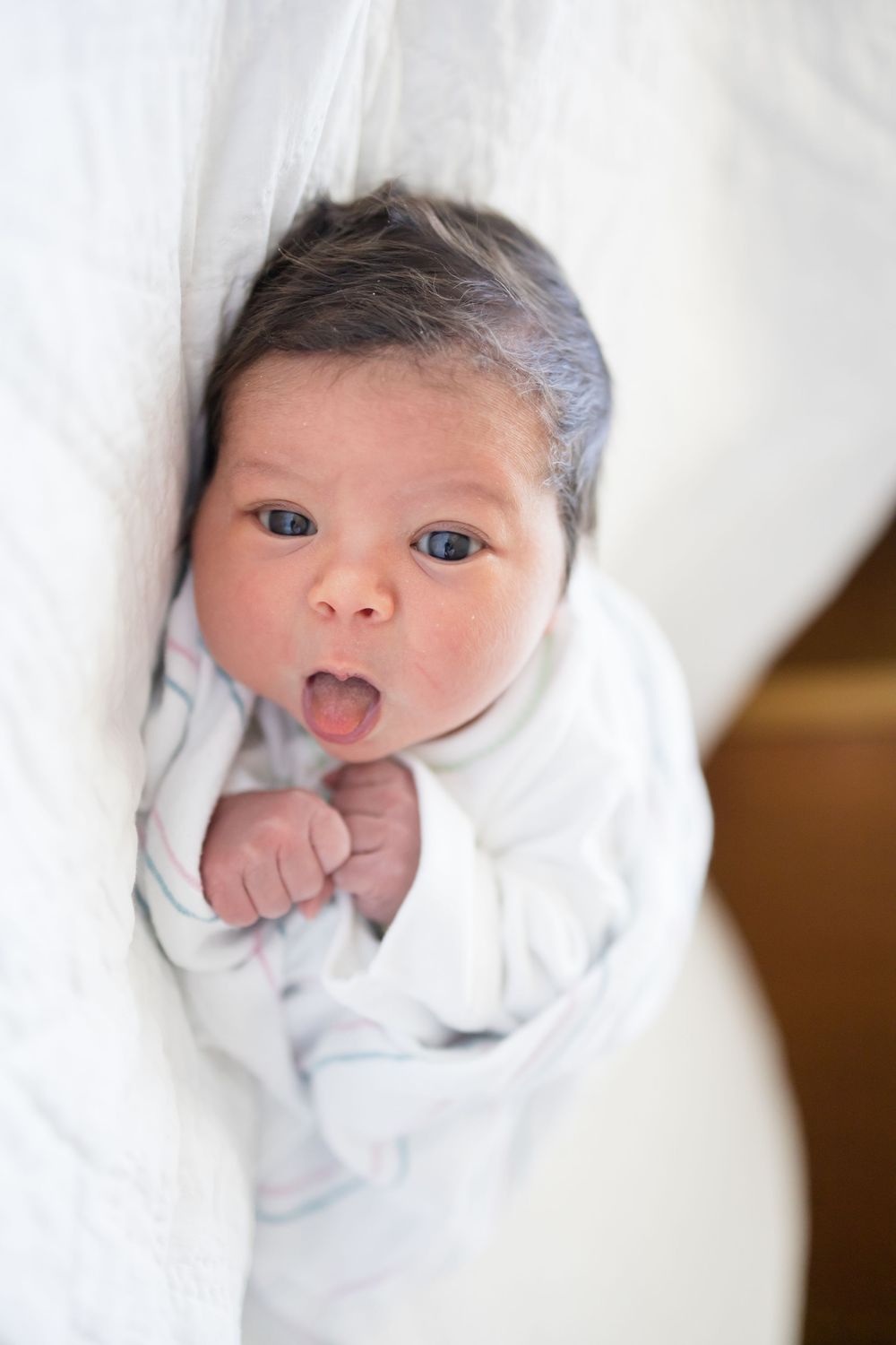 Newborn baby with dark hair during her Fresh 48 session at Fort Sanders Medical Center in Knoxville.