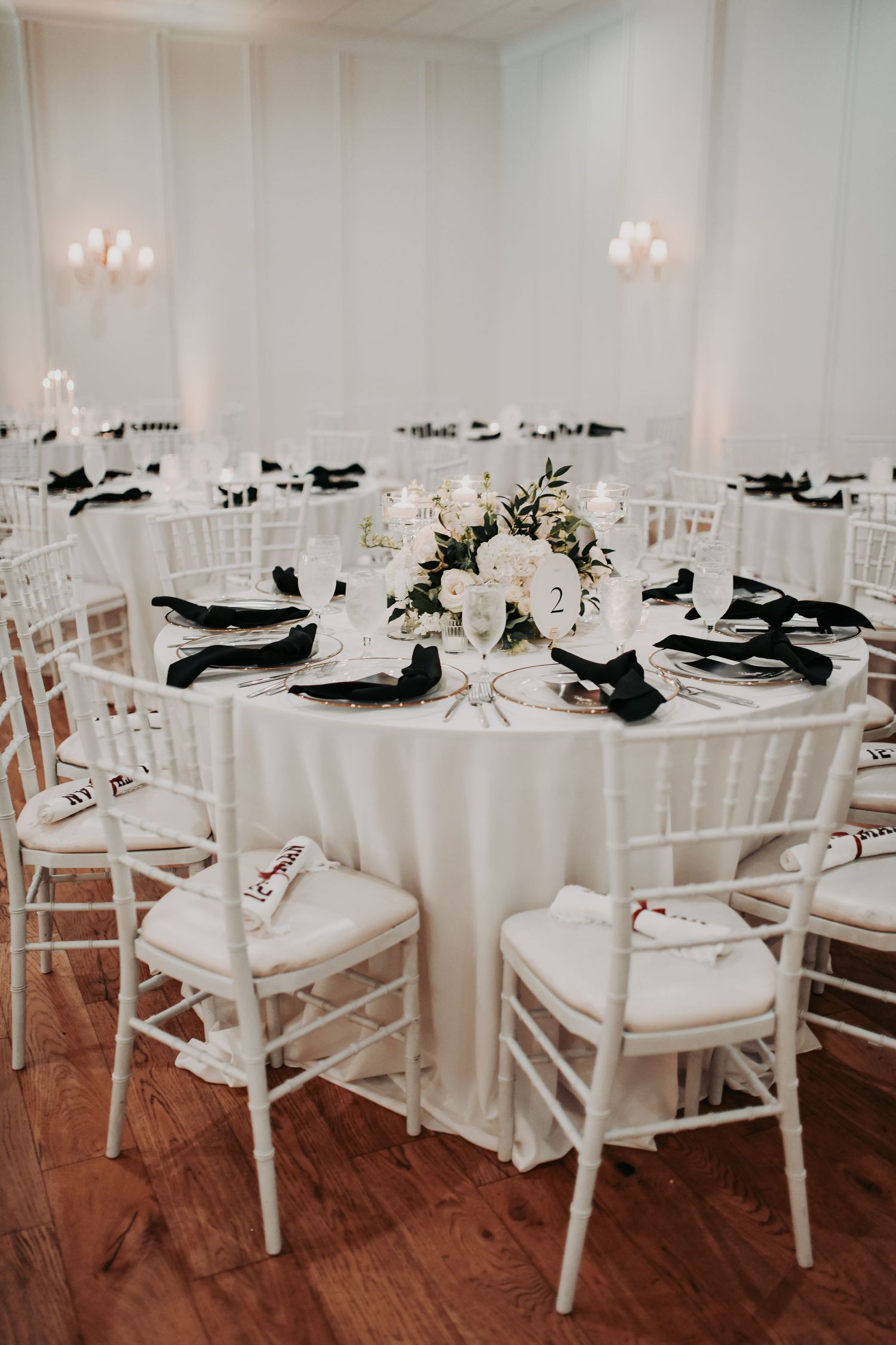 Romantic candlelight glowing throughout Hall on Dragon wedding reception