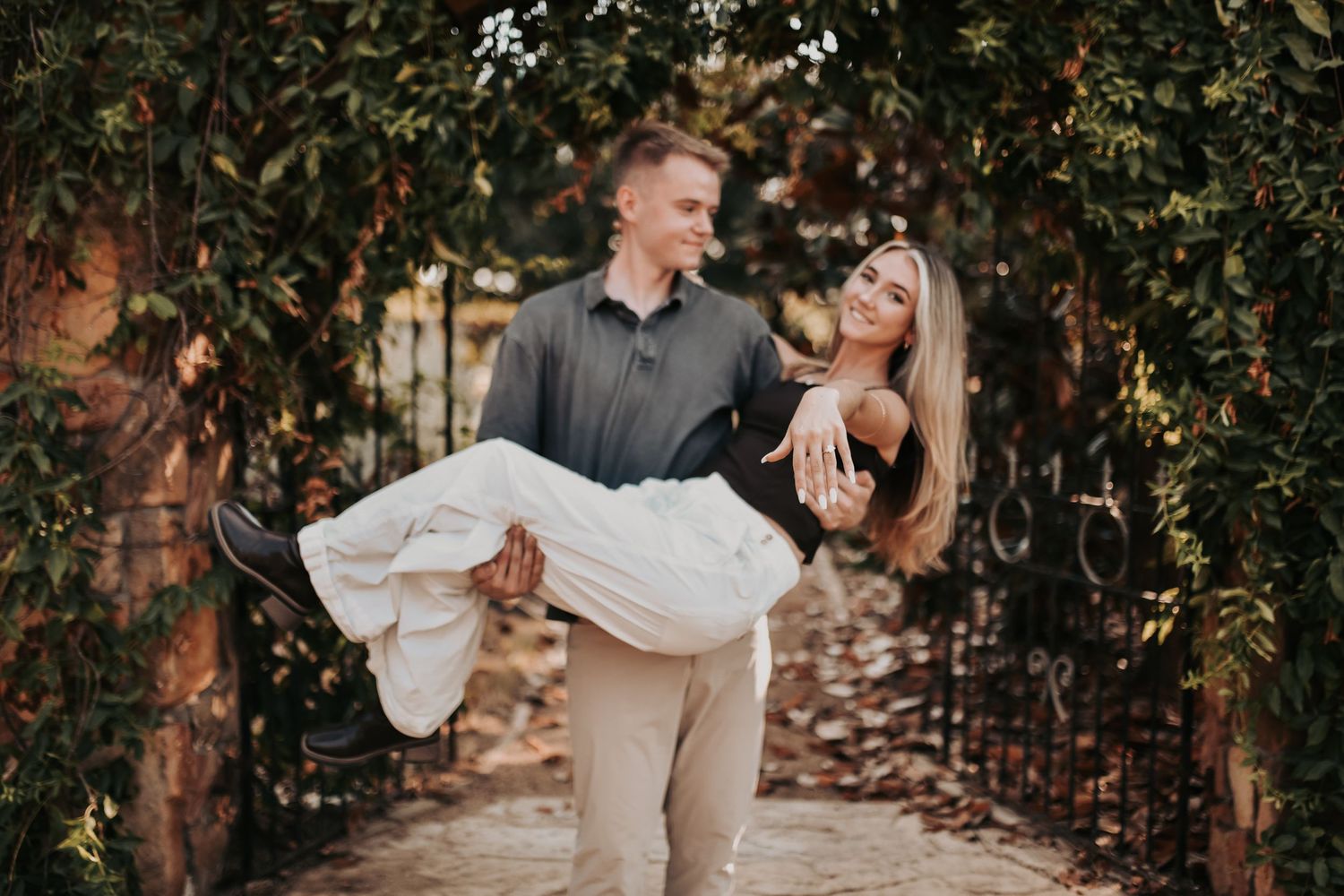 Surprise proposal in Denton Texas surrounded by romantic greenery