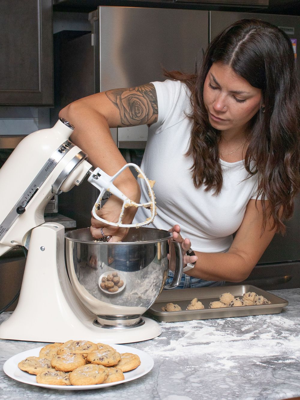 Scooping cookies out of a mixer in Strongsville for branding and headshot photos.