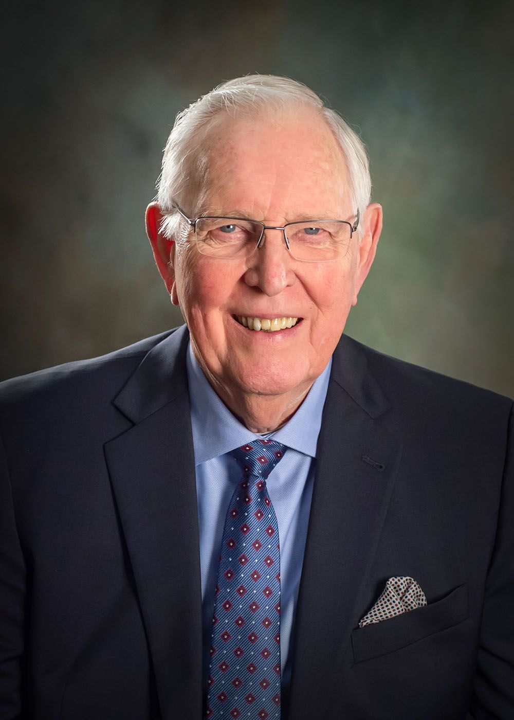 studio corporate portrait of Coeur d Alene company executive owner by professional photographer Luba Wold in Post Falls