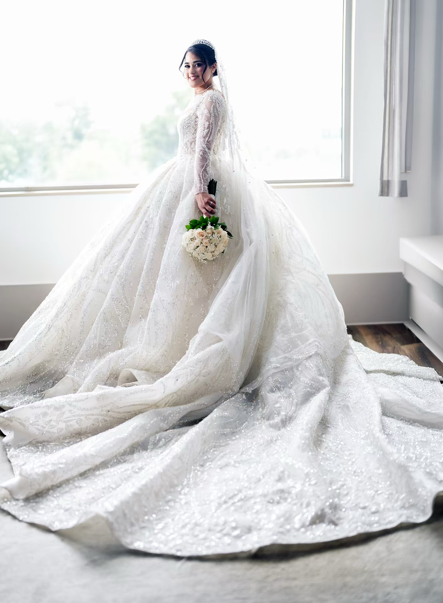 Bride in elegant white dress at renaissance  wedding venue.