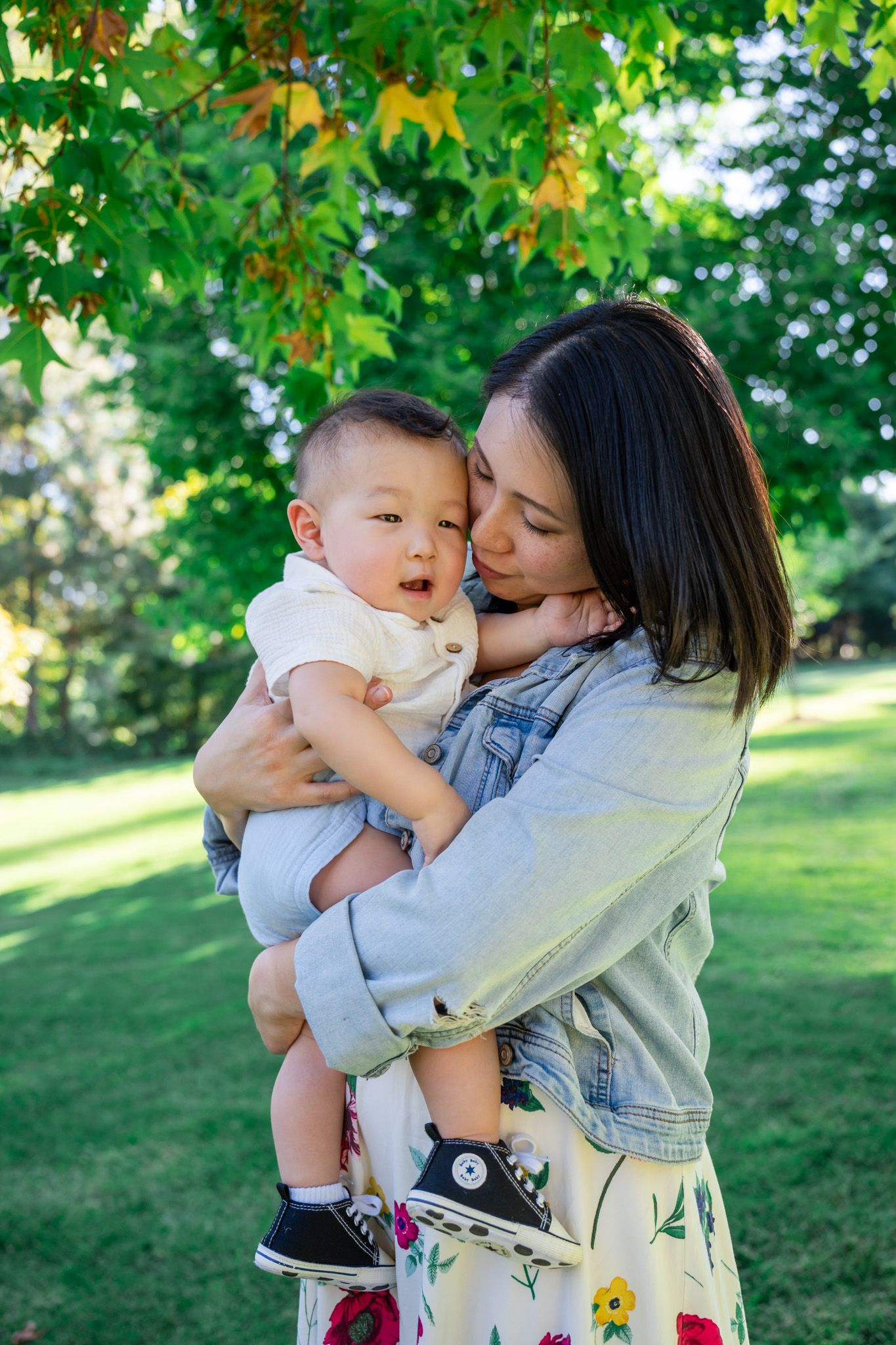 portrait of mom snuggling son