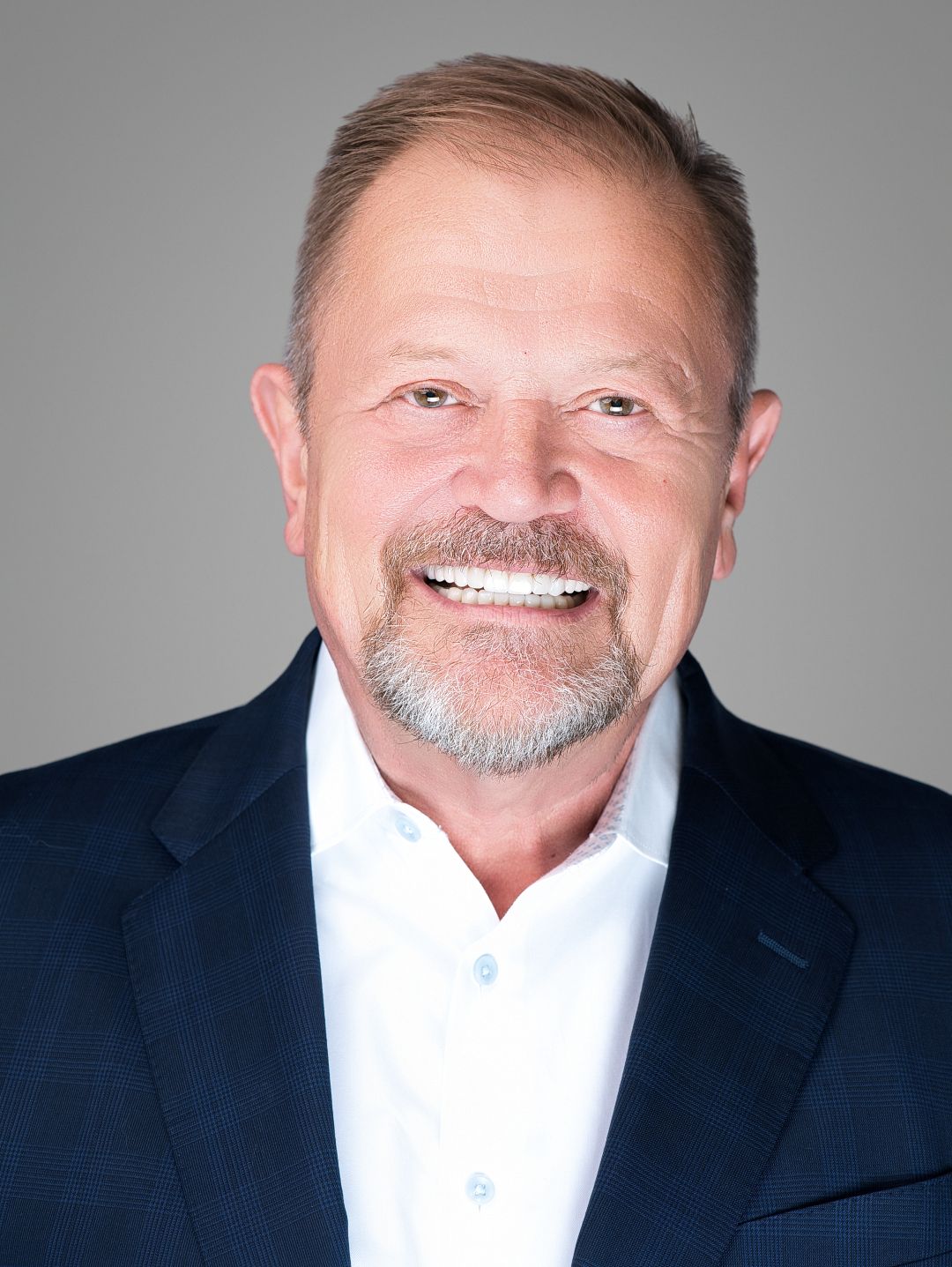 professional-headshot-after fter professional headshot example with modern lighting, sharper detail, and a confident approachable expression