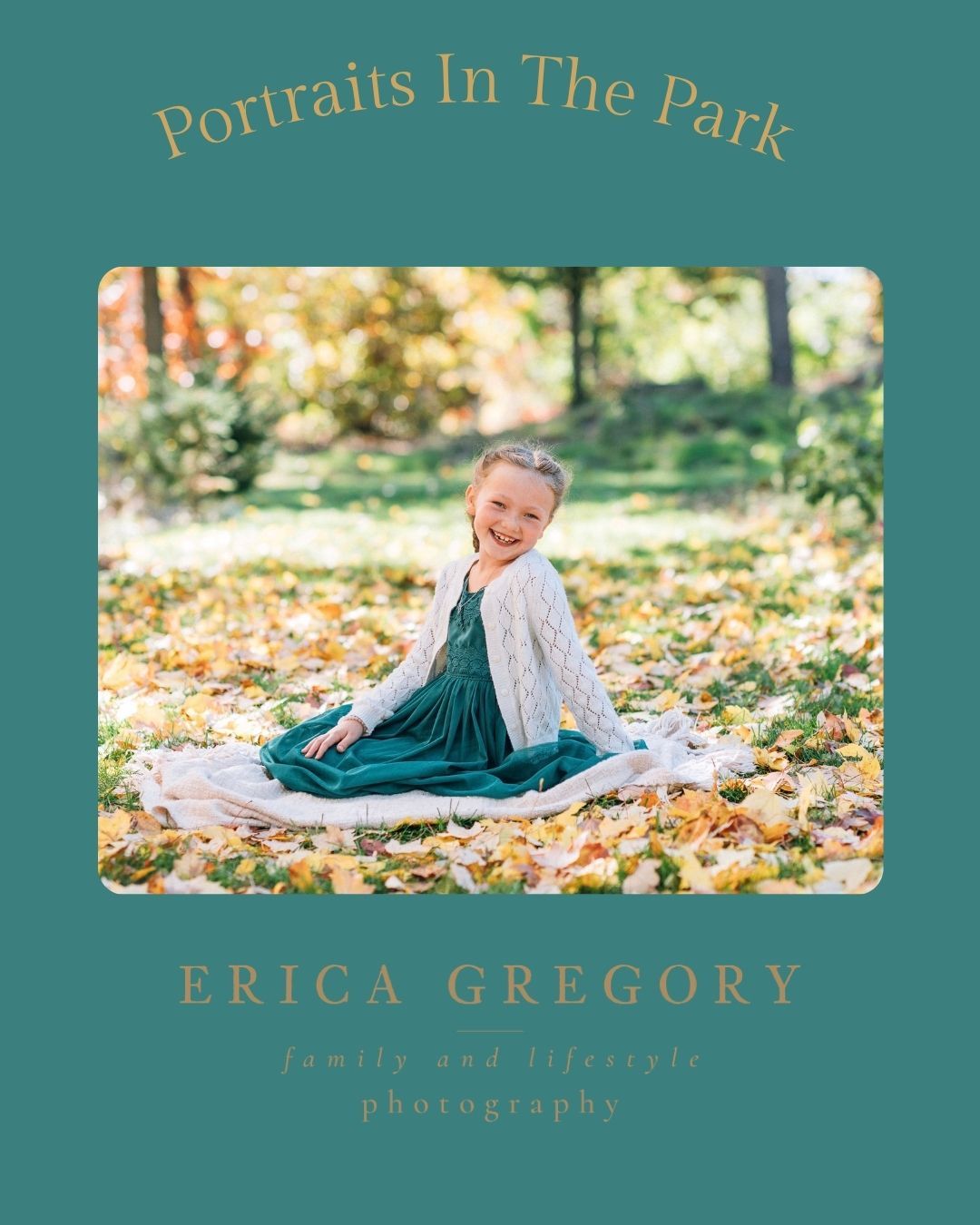 Young girl in teal dress sits smiling on blanket covered in fall leaves for Erica Gregory family portrait session.
