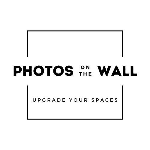 Photos on the Wall logo with minimalist black and white design and upgrade your spaces tagline.