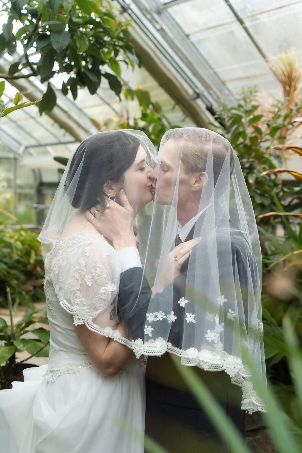 Connecticut College wedding ceremony with bride and groom and bridal party New London venue greenhouse