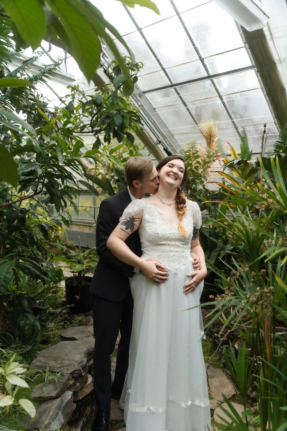 Connecticut College wedding ceremony with bride and groom and bridal party New London venue greenhouse