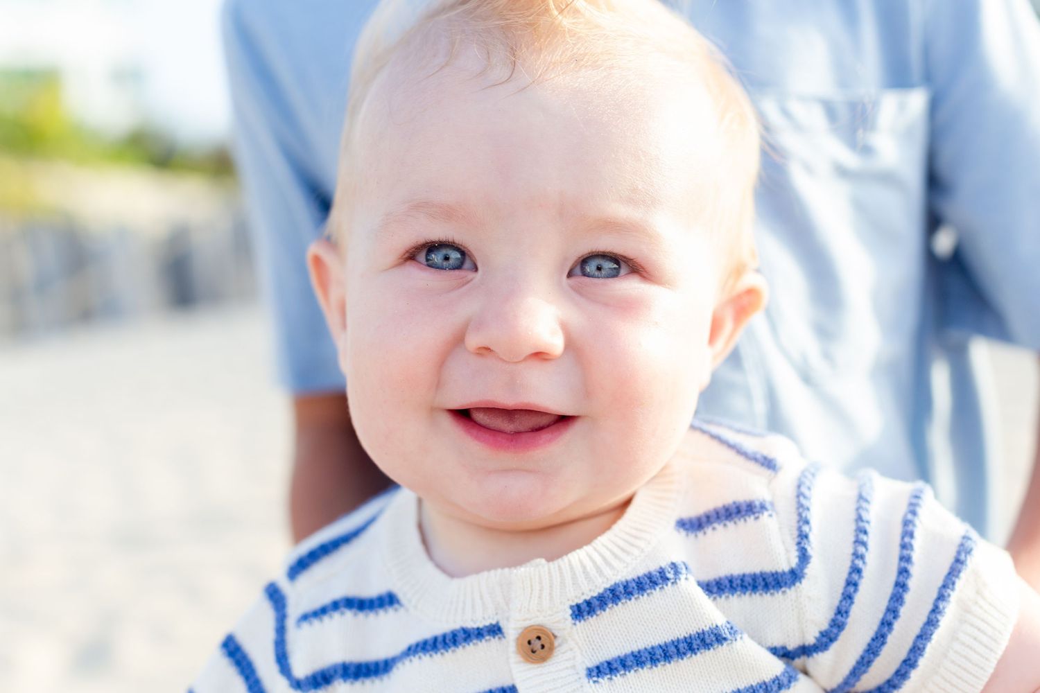 Portrait of a baby boy on the beach in Isla Verde, Carolina, Puerto Rico.