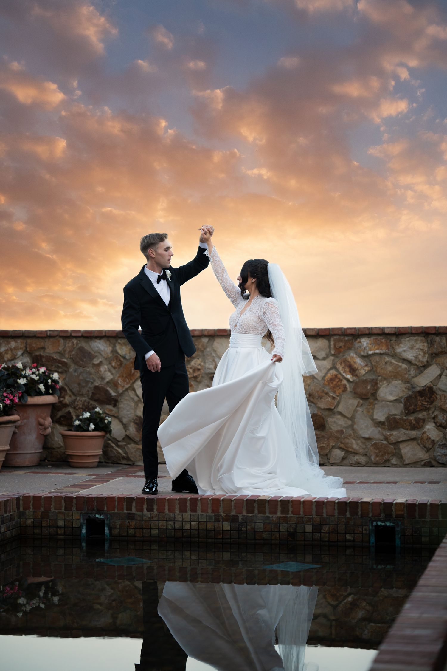Bride and groom sunset portrait Bella Collina terrace Montverde Florida Weddings by Ray