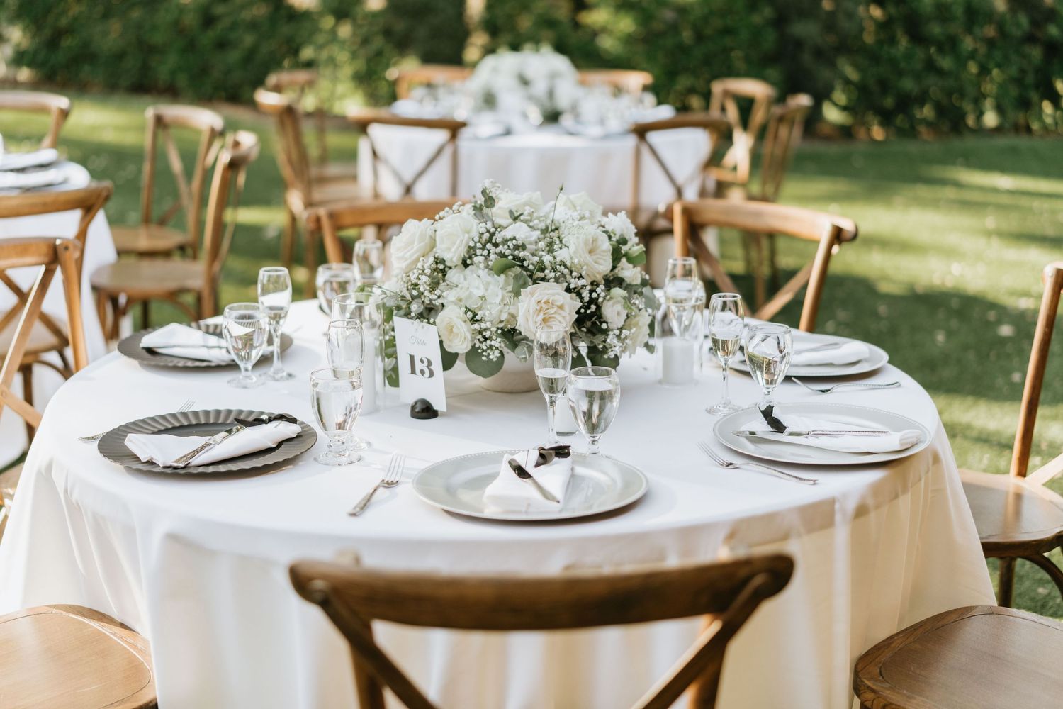 Outdoor wedding table decorated with white flowers at Falkner Winery
