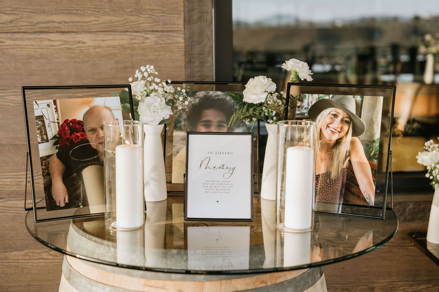 Wedding memorial display honoring absent loved ones