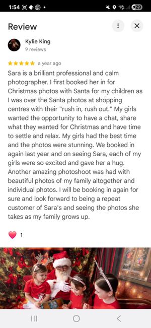 Five-star Google review praising Sara as a professional photographer, featuring a photo of children with Santa in festive Christmas setting.