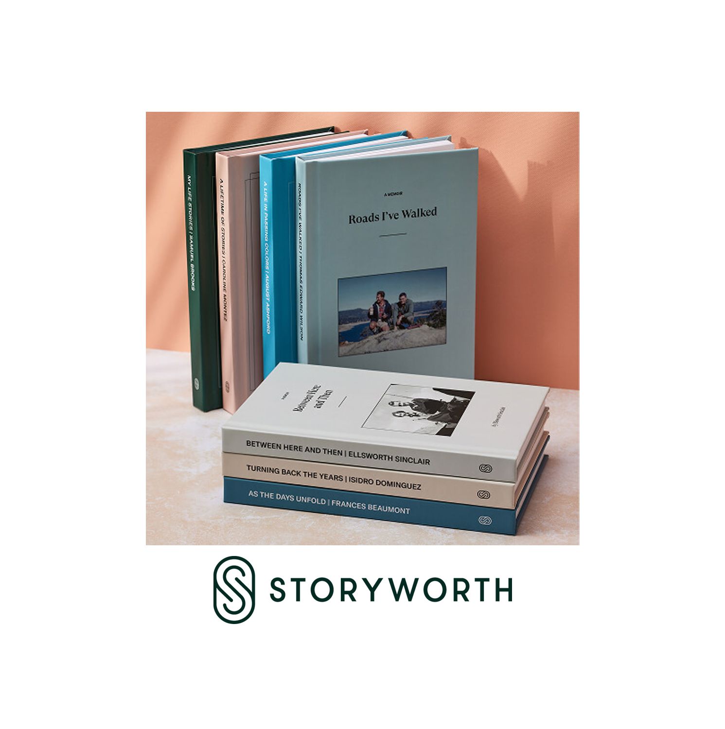 Stack of personalized Storyworth hardcover memory books displayed against a warm terracotta background with the Storyworth logo below.
