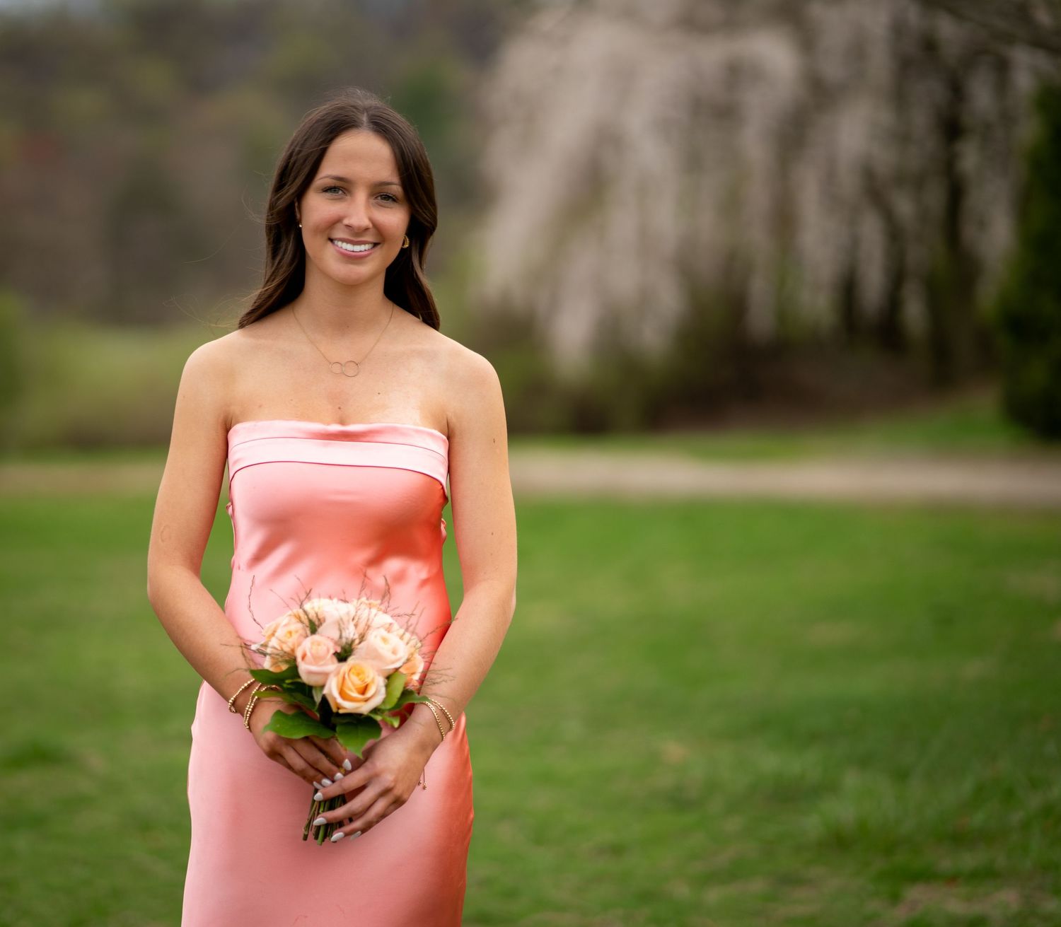 High school girl poses before headed off to her dance.