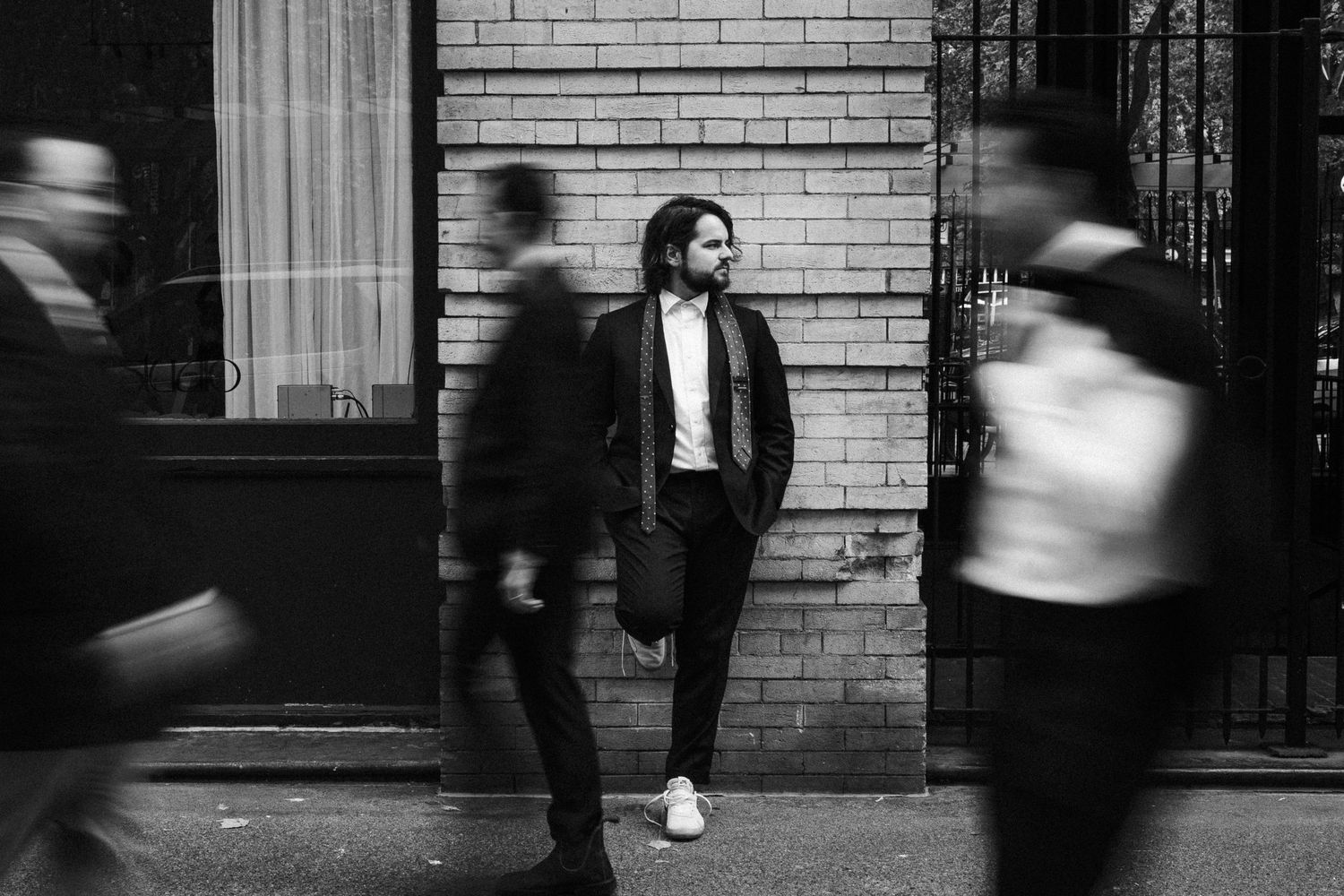 Editorial photo of Ryker's and groomsmen in black and white with motion blur at their 210 pioneer square wedding in Seattle.