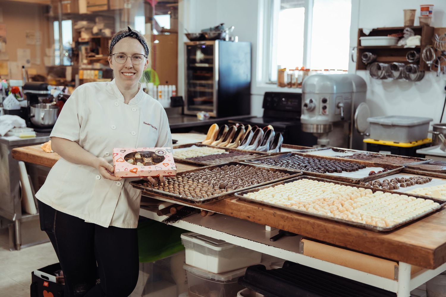 Commercial photography of a local baker preparing handmade baked goods in her Alberta kitchen”
