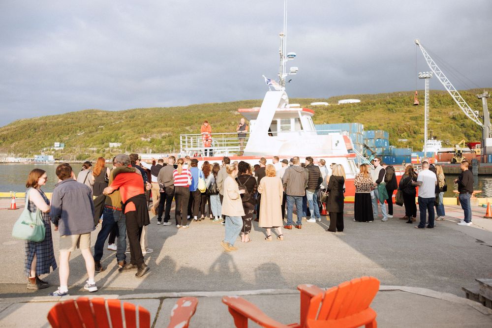 Wedding welcome party sailing along the coast of Newfoundland by documentary wedding photographer Kaitlyn Yvette