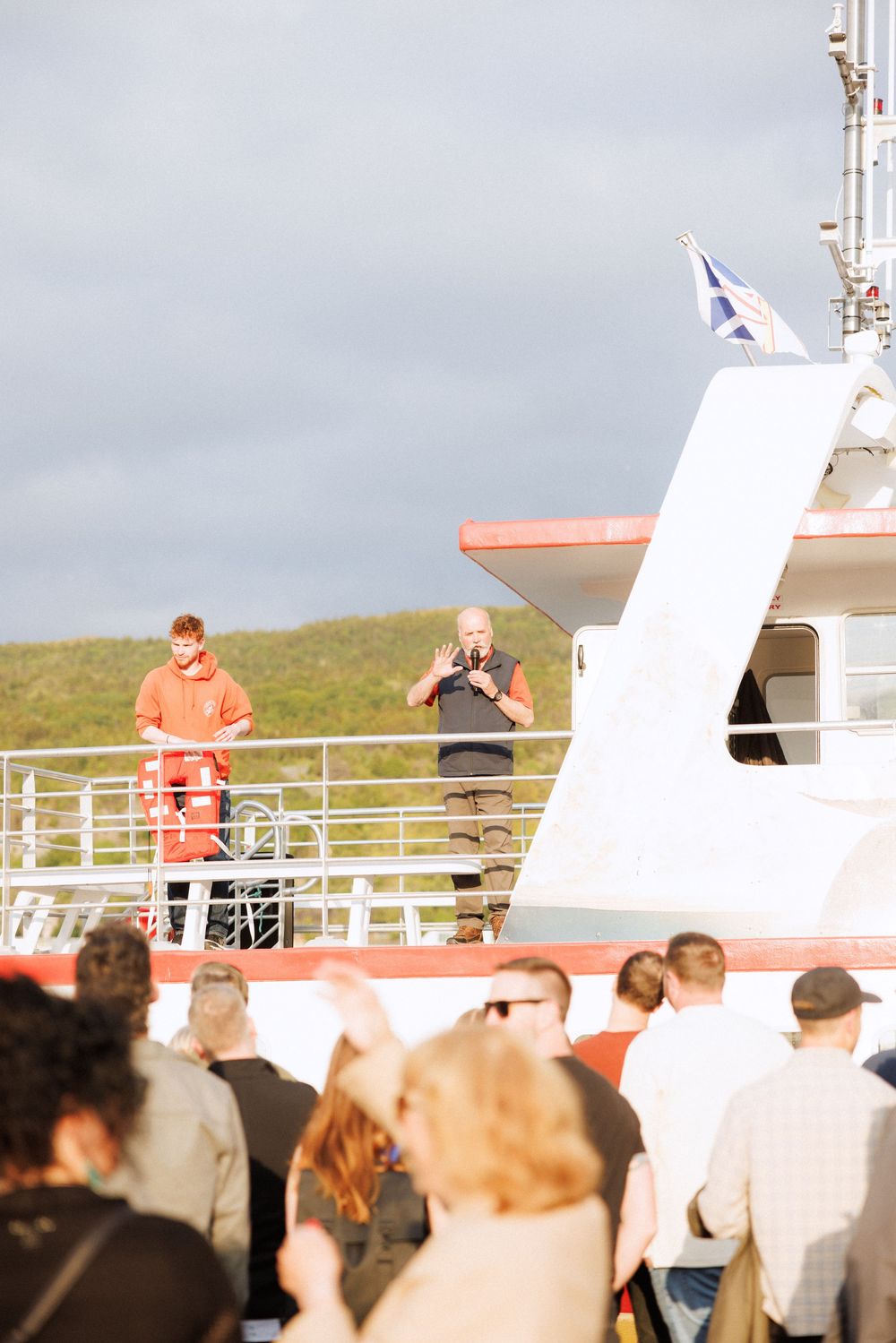 Wedding welcome party sailing along the coast of Newfoundland by documentary wedding photographer Kaitlyn Yvette