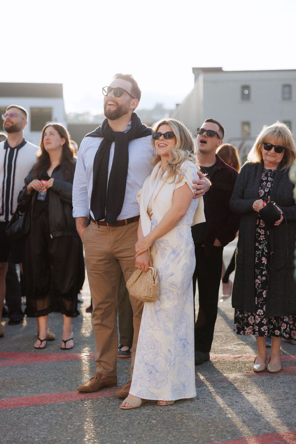 Candid wedding welcome party moments aboard a boat in Newfoundland by documentary wedding photographer Kaitlyn Yvette