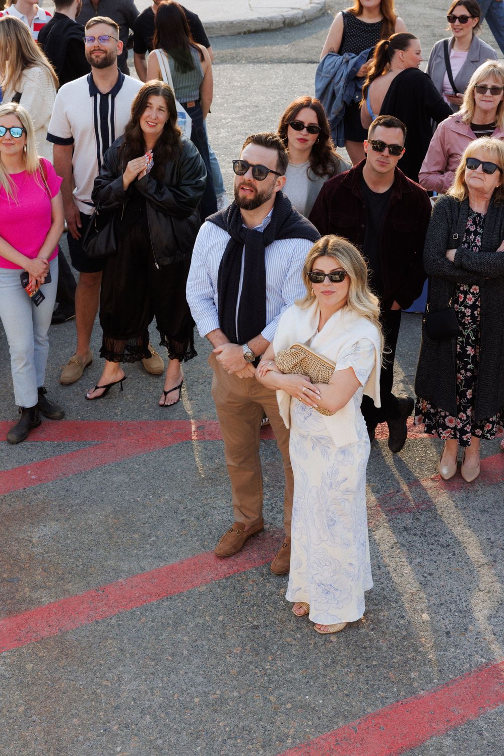 Candid wedding welcome party moments aboard a boat in Newfoundland by documentary wedding photographer Kaitlyn Yvette