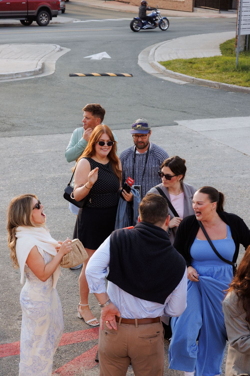 Candid wedding welcome party moments aboard a boat in Newfoundland by documentary wedding photographer Kaitlyn Yvette