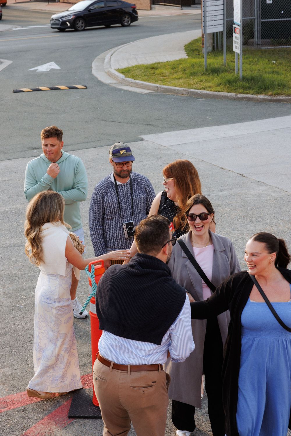Candid wedding welcome party moments aboard a boat in Newfoundland by documentary wedding photographer Kaitlyn Yvette