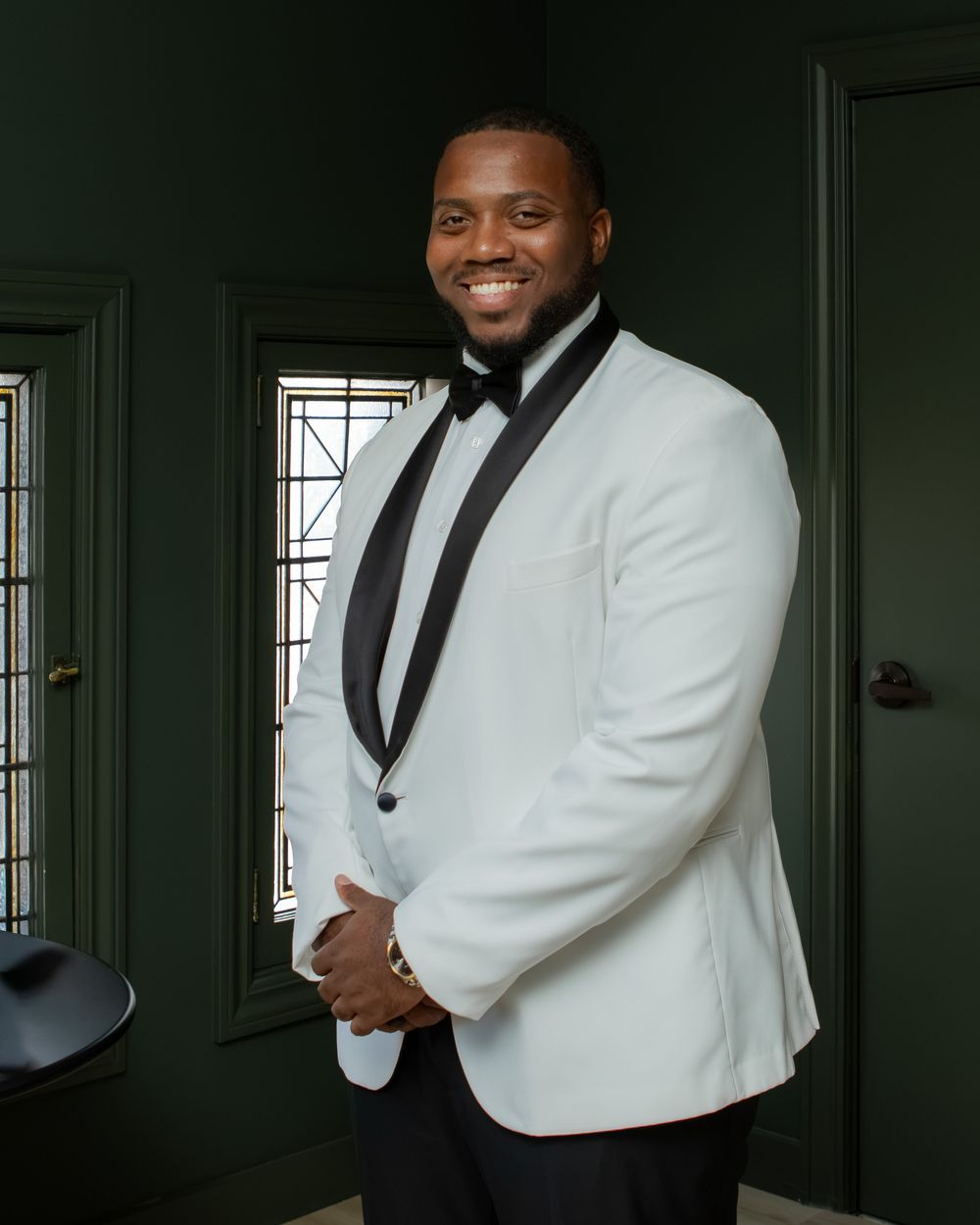Groom in getting ready suite before his wedding.