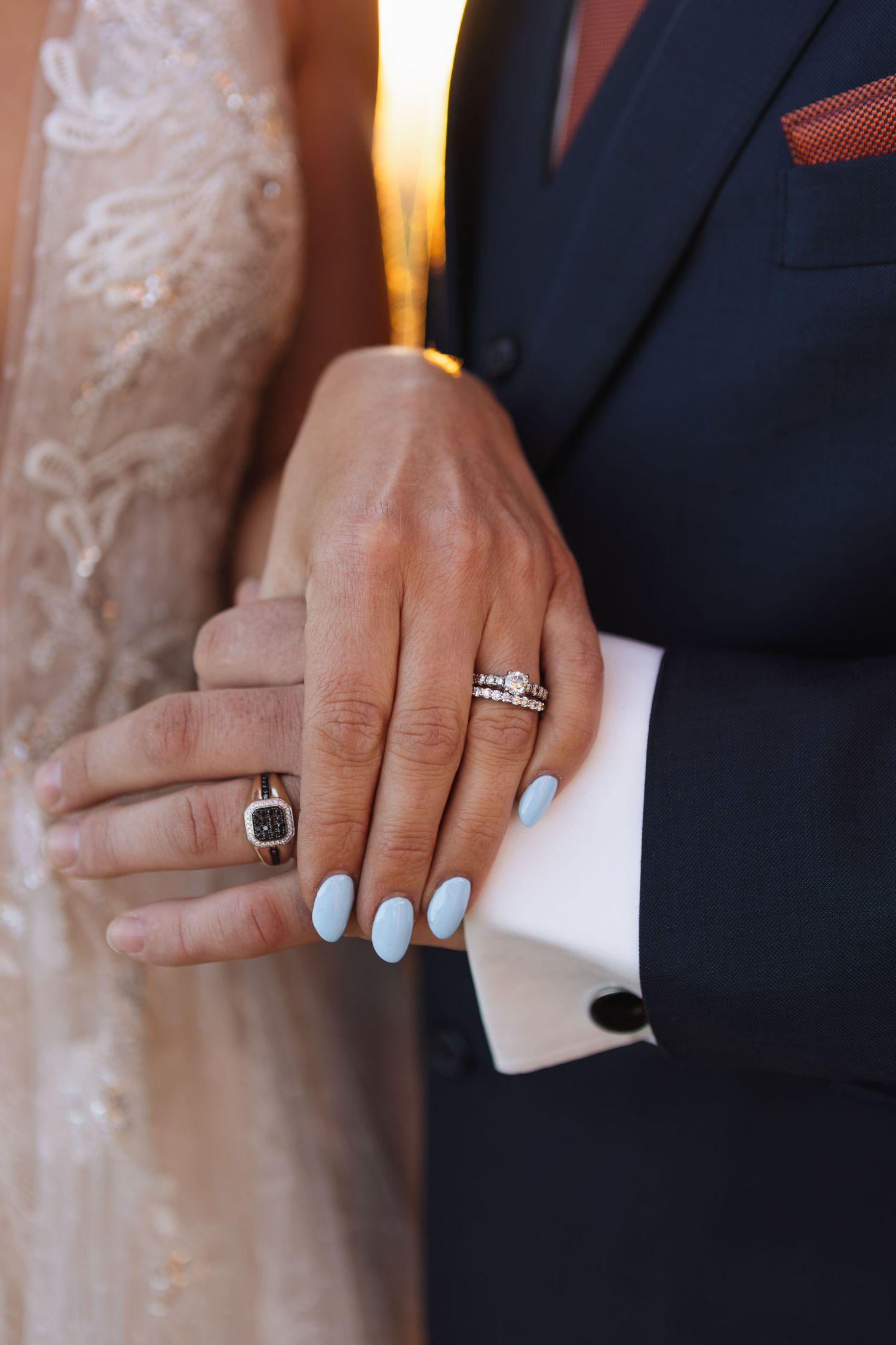 Closeup of Kylie and Jono's rings during sharing private wedding vows on a mountaintop near Moonan Cottage