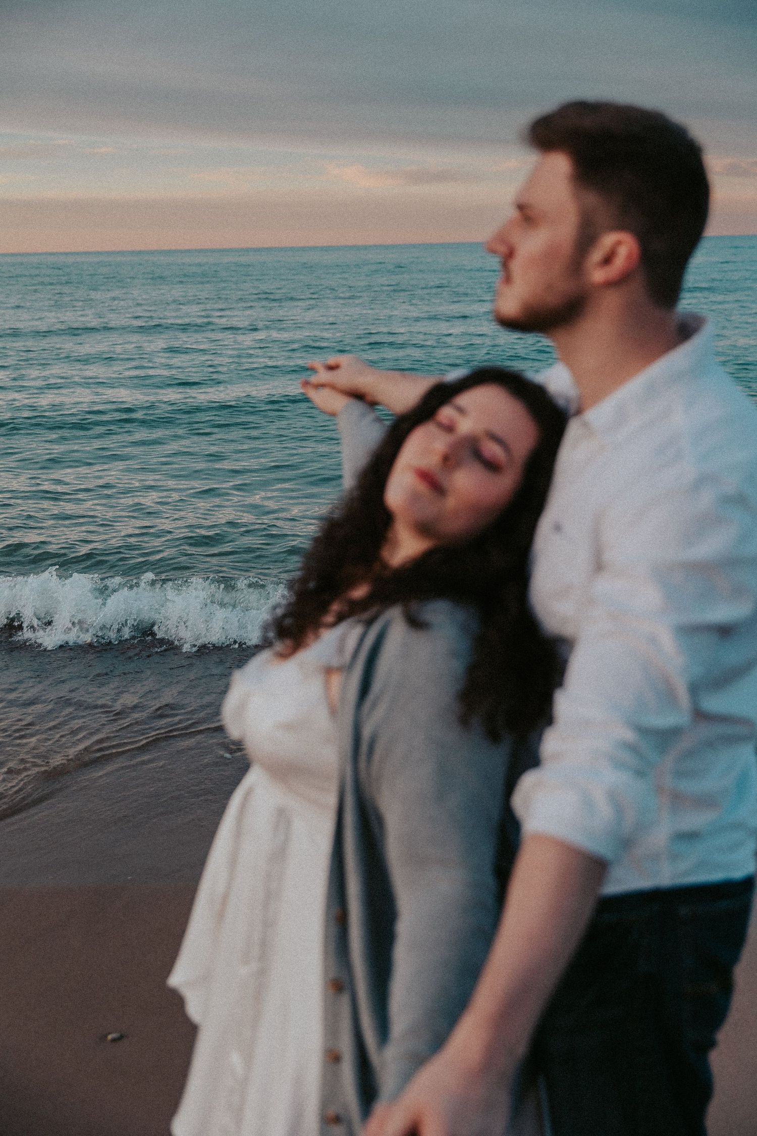 beach engagement session in Chicago Illinois Chicago beach photography of couples cinematic storytelling photography