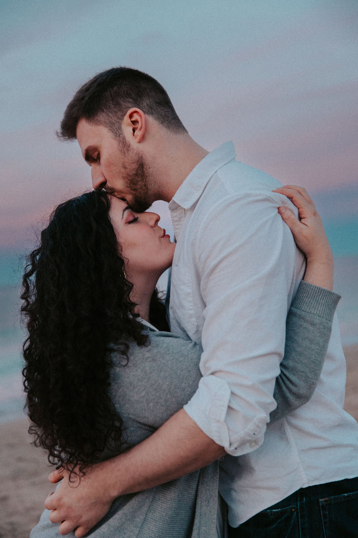 beach engagement session in Chicago Illinois Chicago beach photography of couples cinematic storytelling photography
