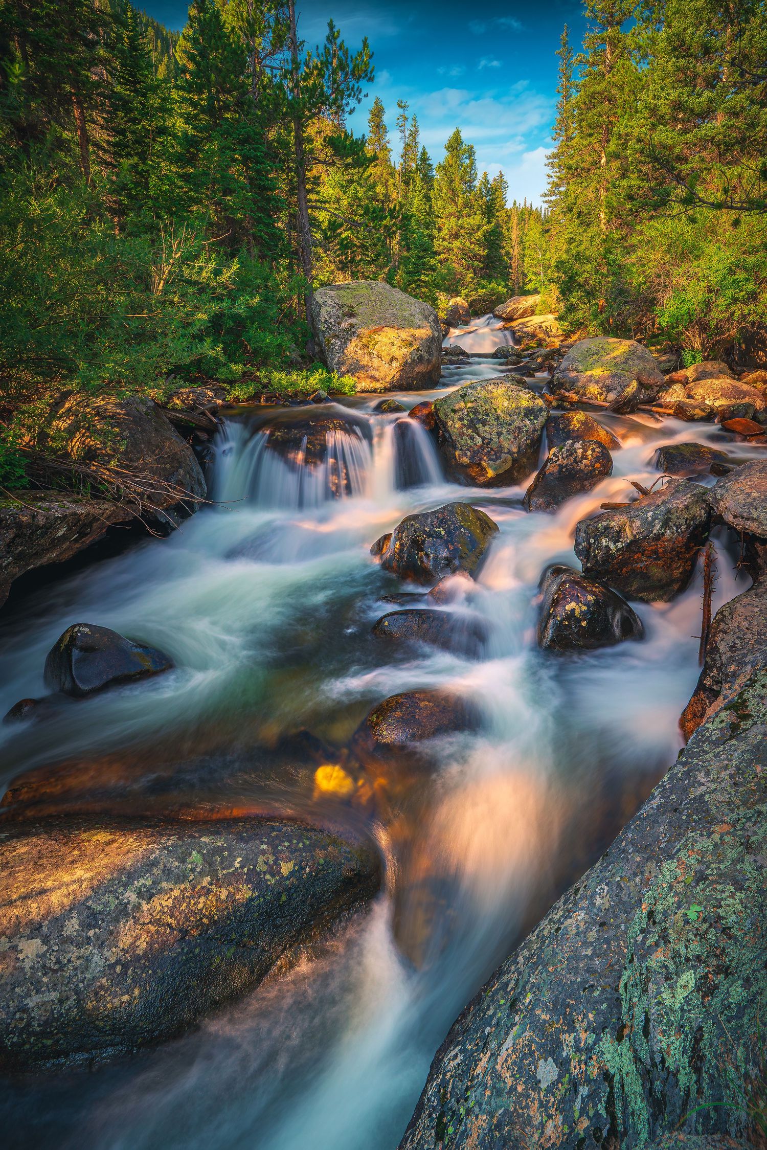 Fine art nature landscape photography, river and waterfall long exposure in a Northern Colorado canyon.