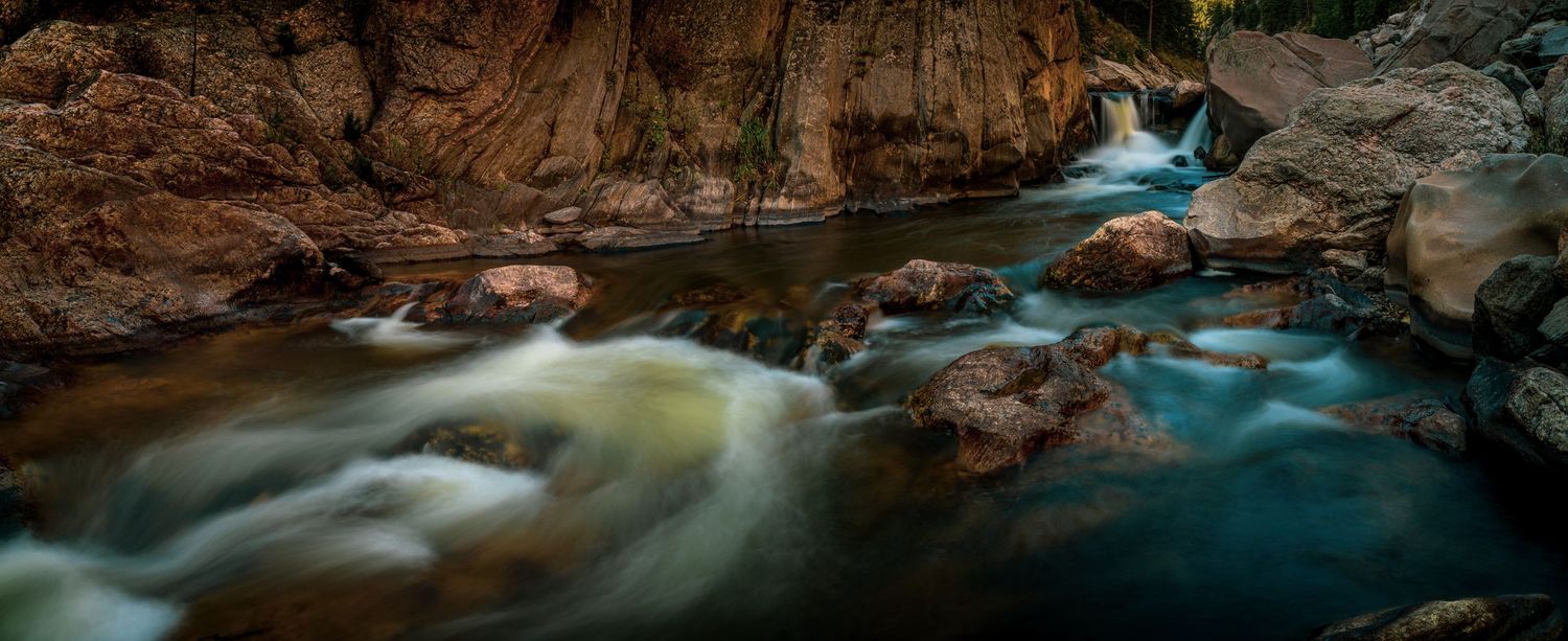 Fine art nature landscape photography, river and waterfall long exposure in a Northern Colorado canyon.
