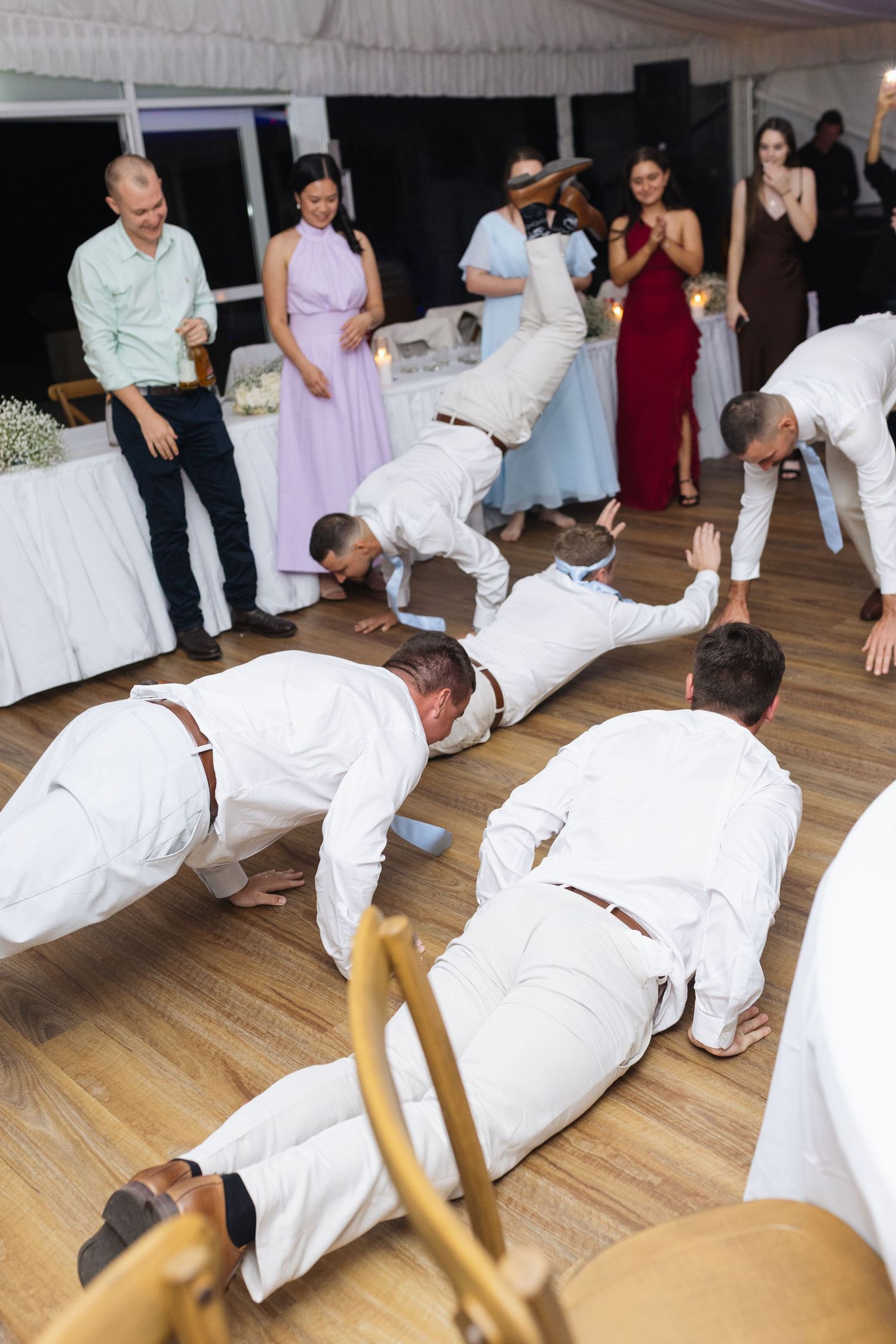 people dancing on dance floor at country wedding