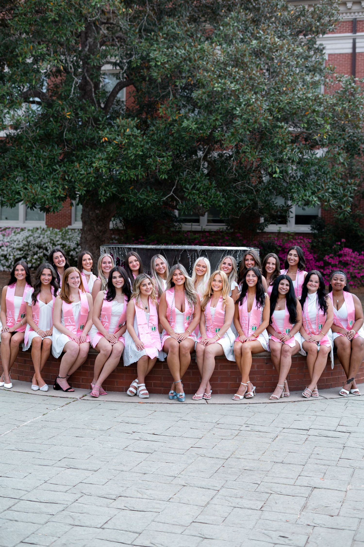 Georgia College graduation photos in front of the gcsu fountain, one of the best spots on the Milledgeville, georgia campus