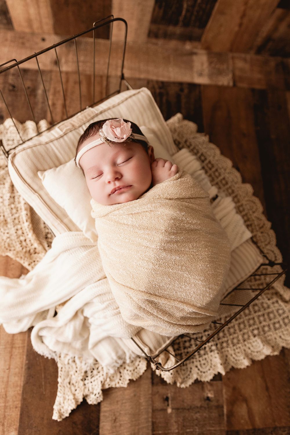 newborn baby in bed north Georgia photographer