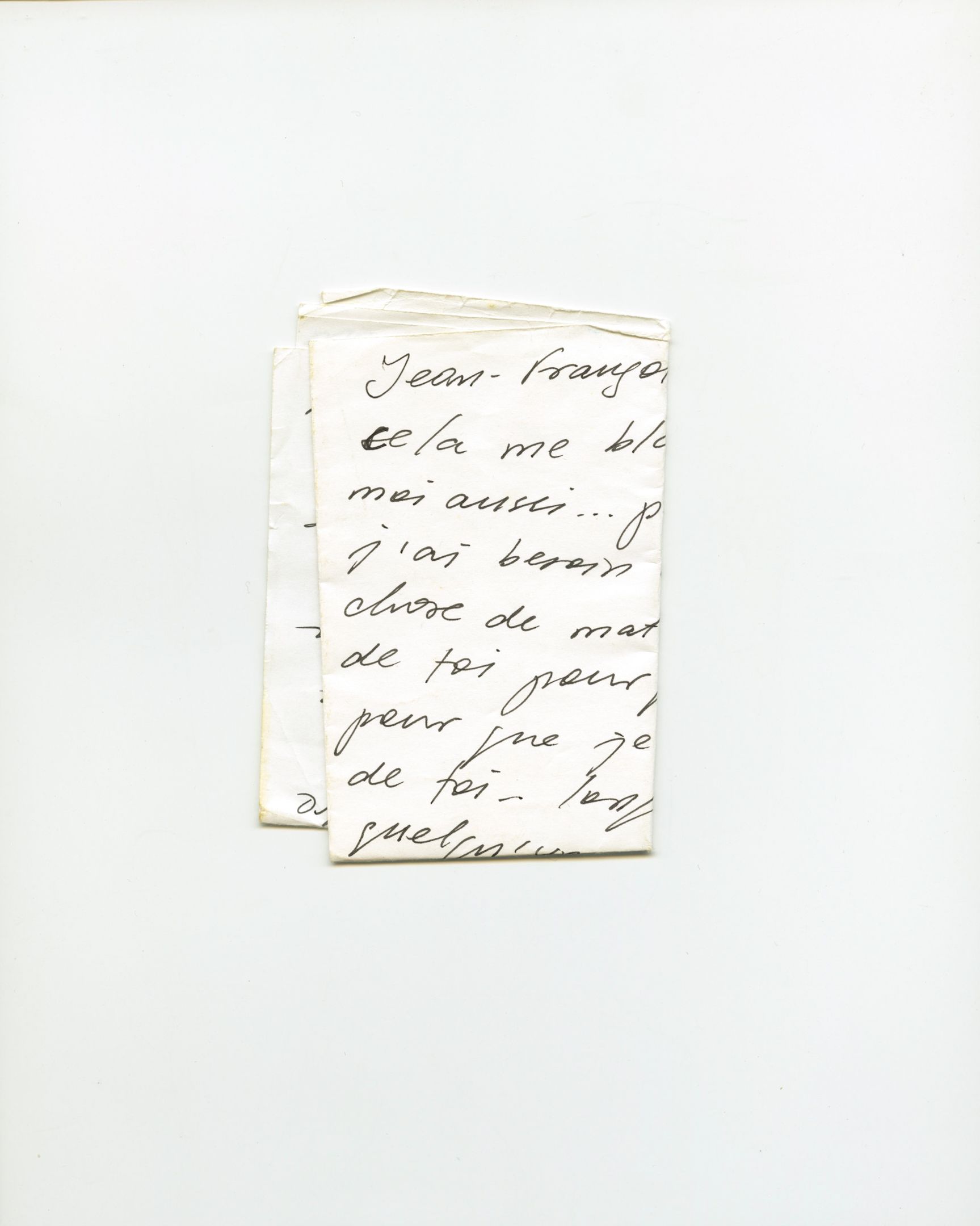 Handwritten French letter on folded paper beginning with "Jean-François", written in cursive black ink.
