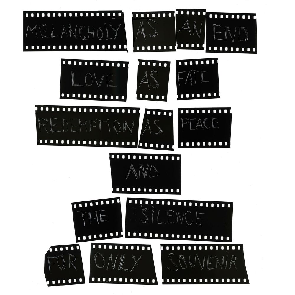 Film strip pieces arranged to spell melancholy as an end, love as fate, redemption as peace, and the silence for only souvenir.