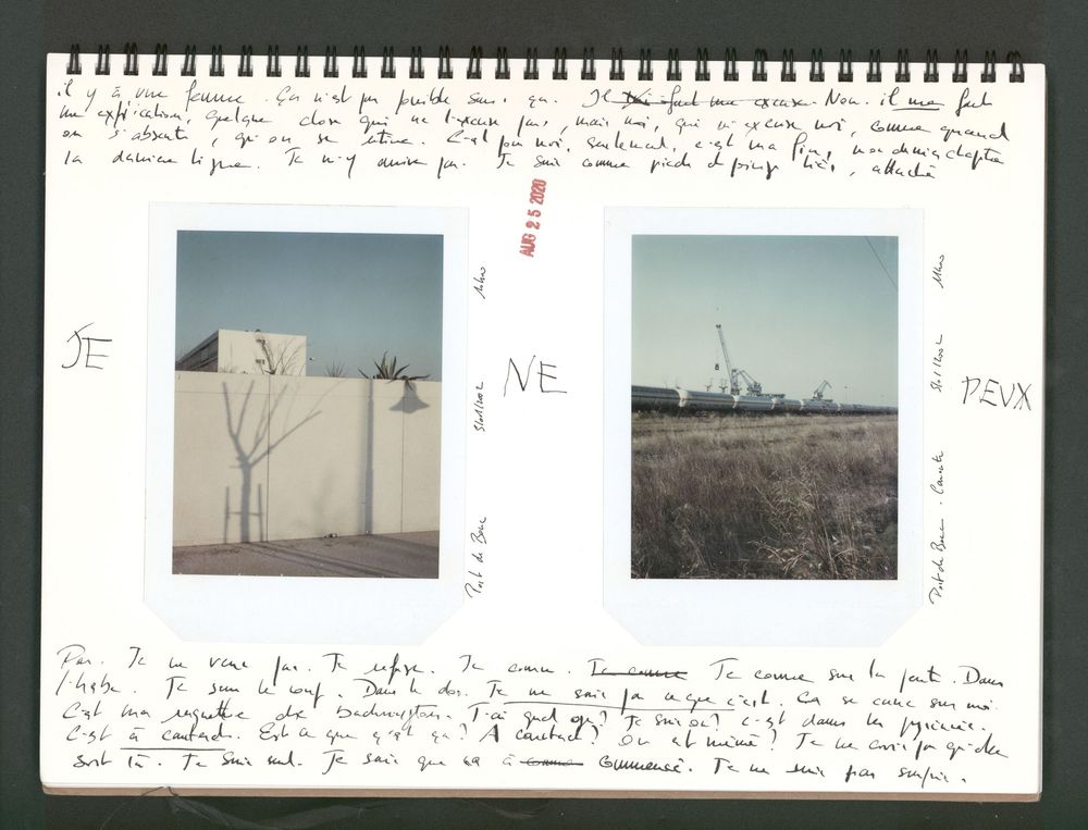 A spiral-bound notebook with handwritten notes and two Polaroid photos of landscapes, including a tree and a ship near water.
