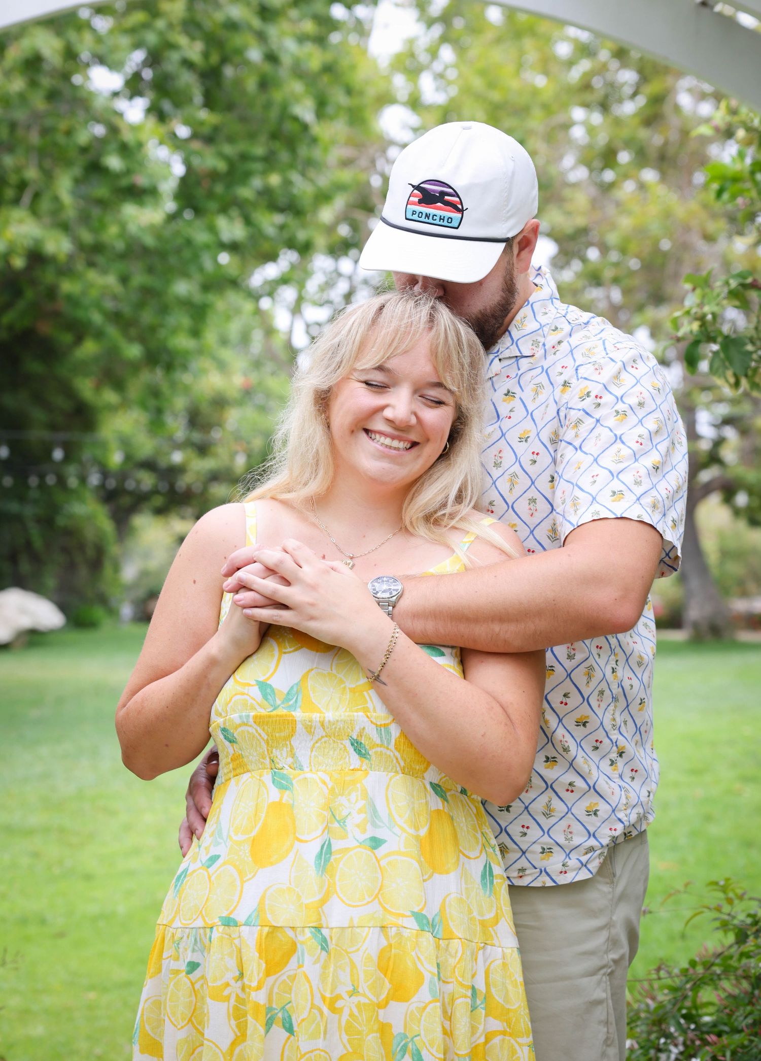 Couple shares an embrace in the Secret Garden at the Madonna Inn in San Luis Obispo