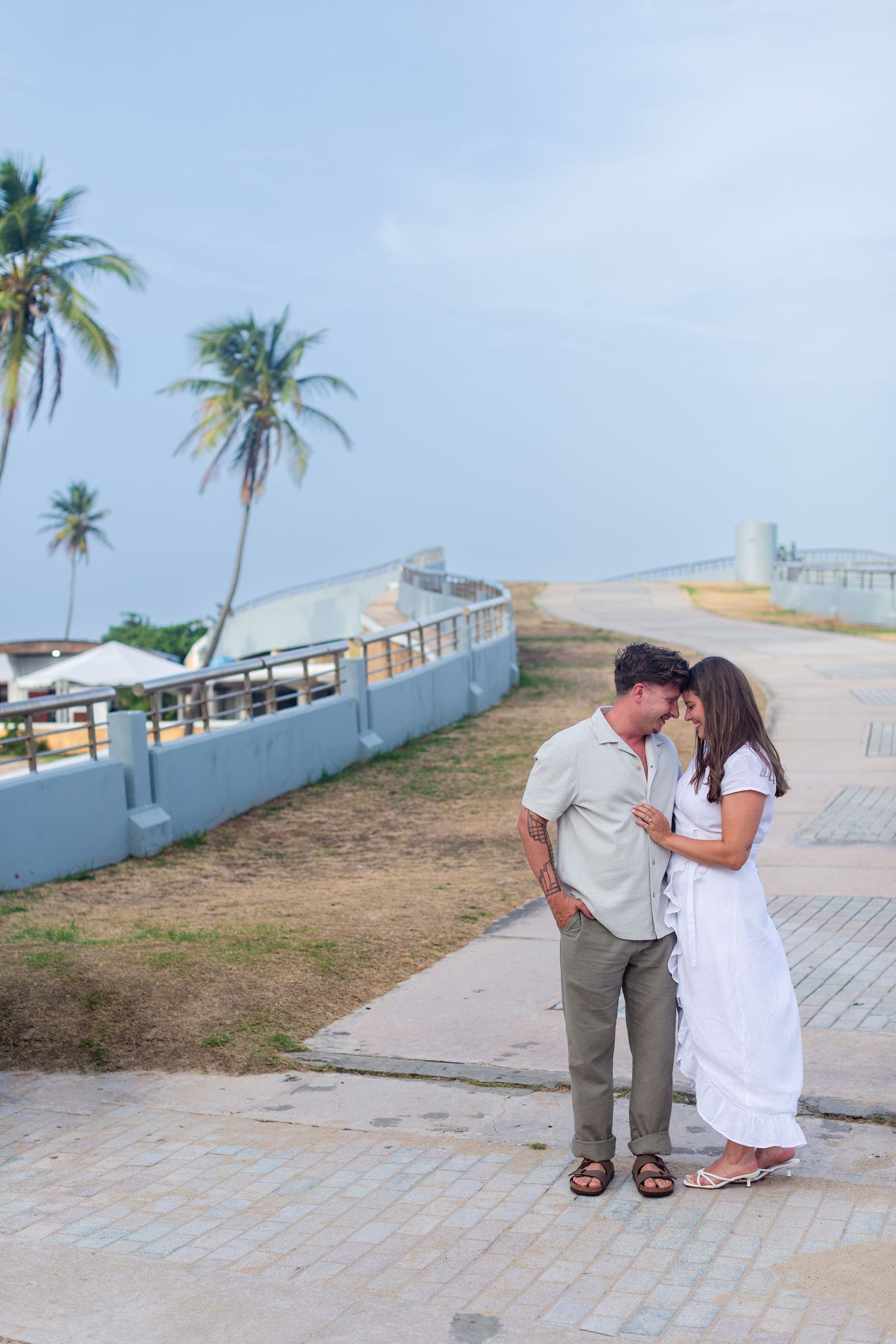 Couples portrait near the beach at Balneario del Escambrón in Old San Juan, Puerto Rico.
