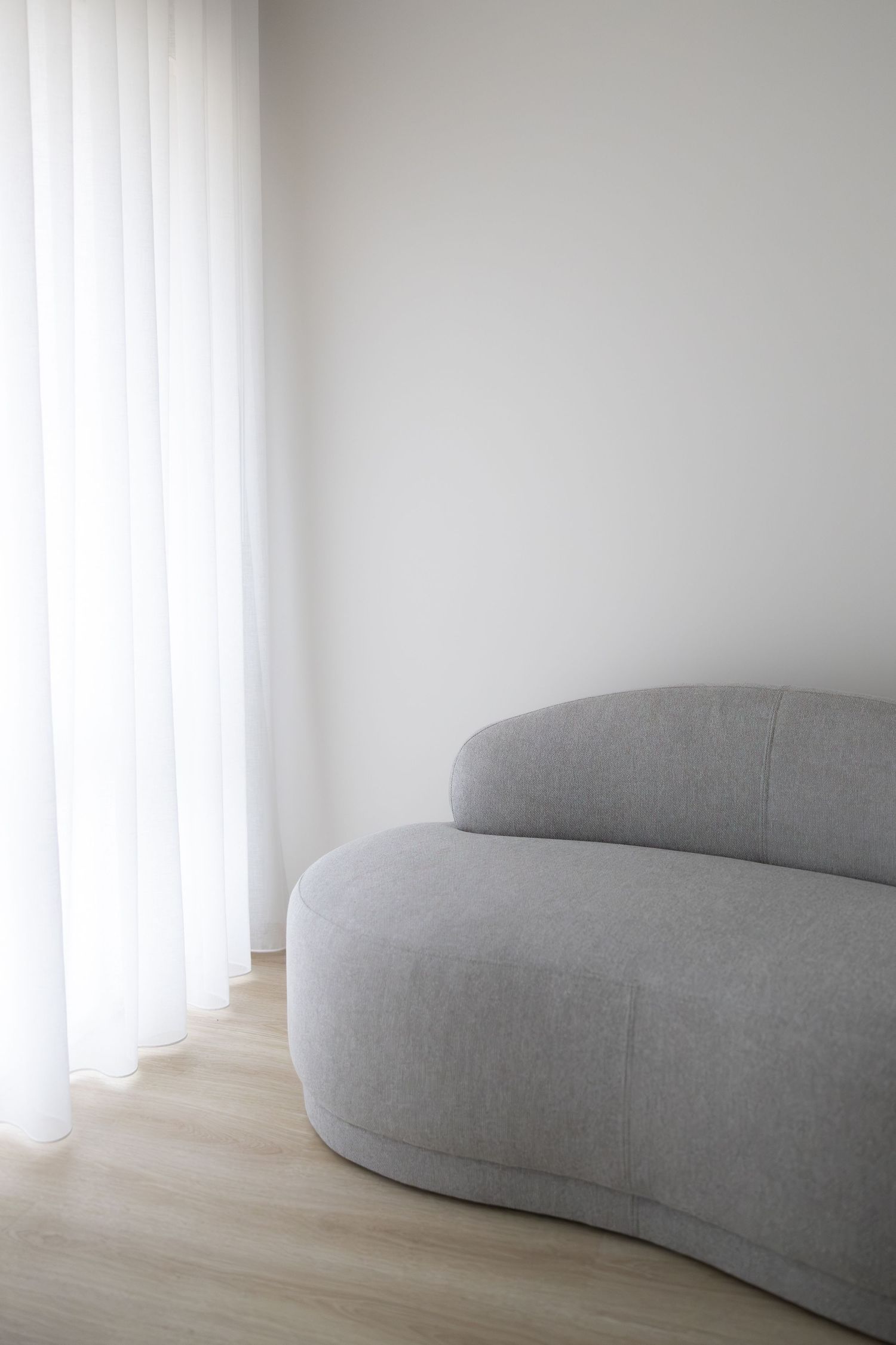 Curved armchair at Photography by Milly natural light studio in Wannanup for photography sessions.